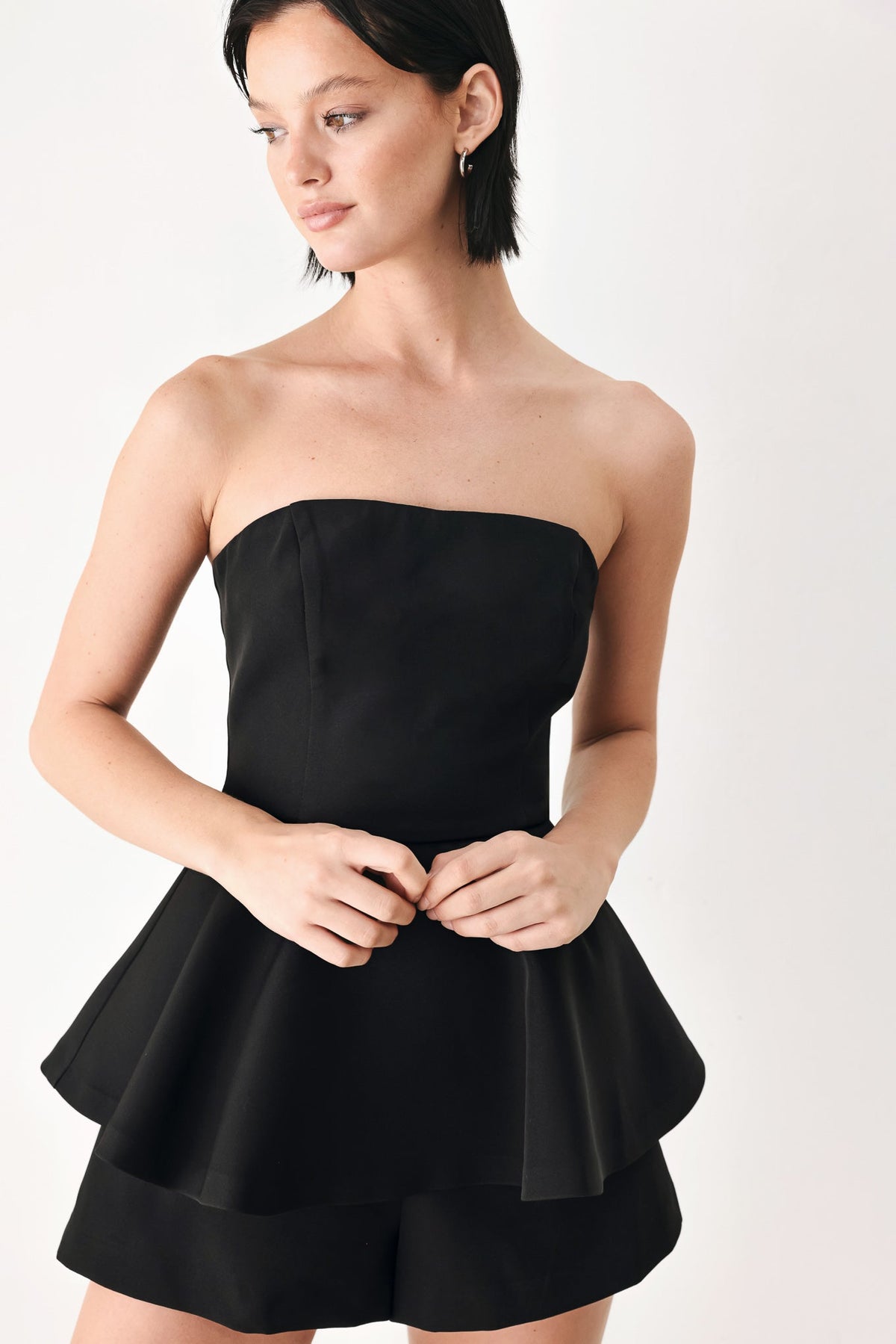 LITTLE BLACK MOMENT STRAPLESS PEPLUM ROMPER
