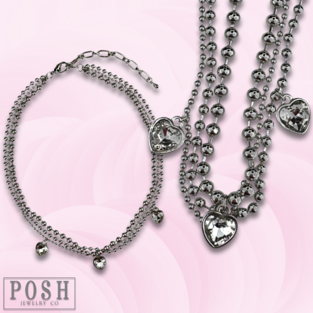Three strand rhinestone heart charm necklace