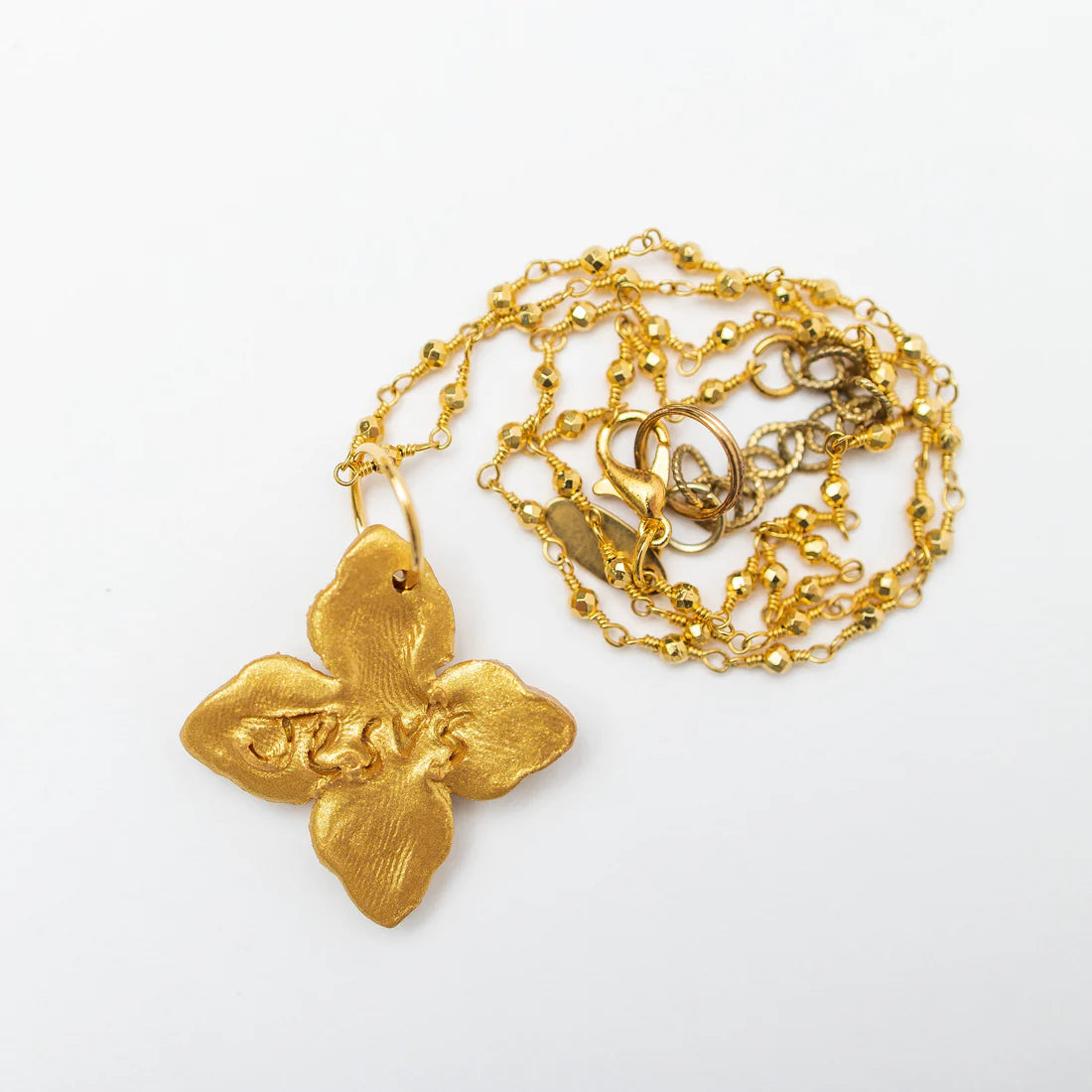 HT1 Hidden Truth Gold Pyrite Chain with Kait Cross