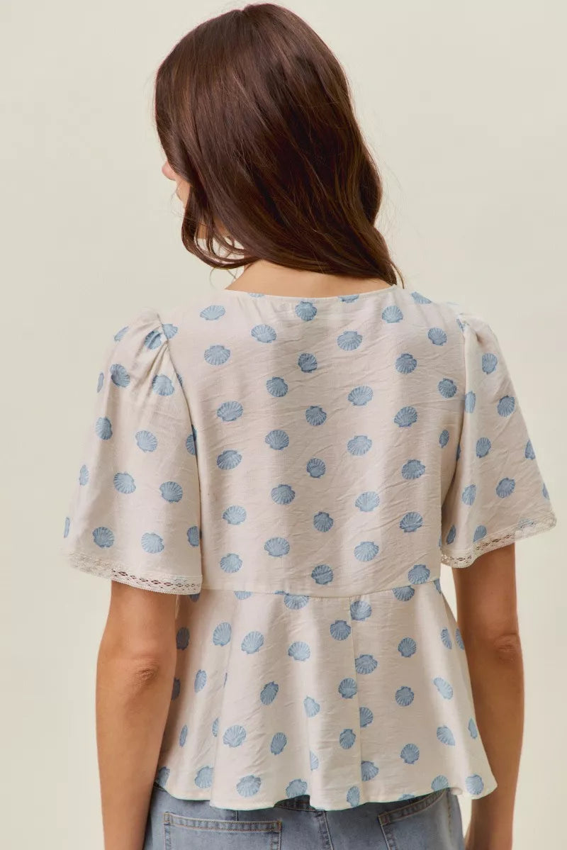 Ivory Shell Print Tie Front Flutter Sleeves Blouse by So Me