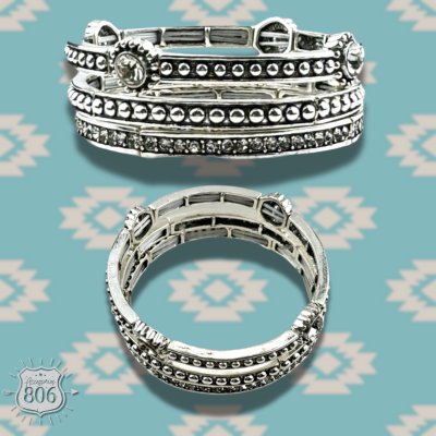Three piece silver and rhinestone bracelet set