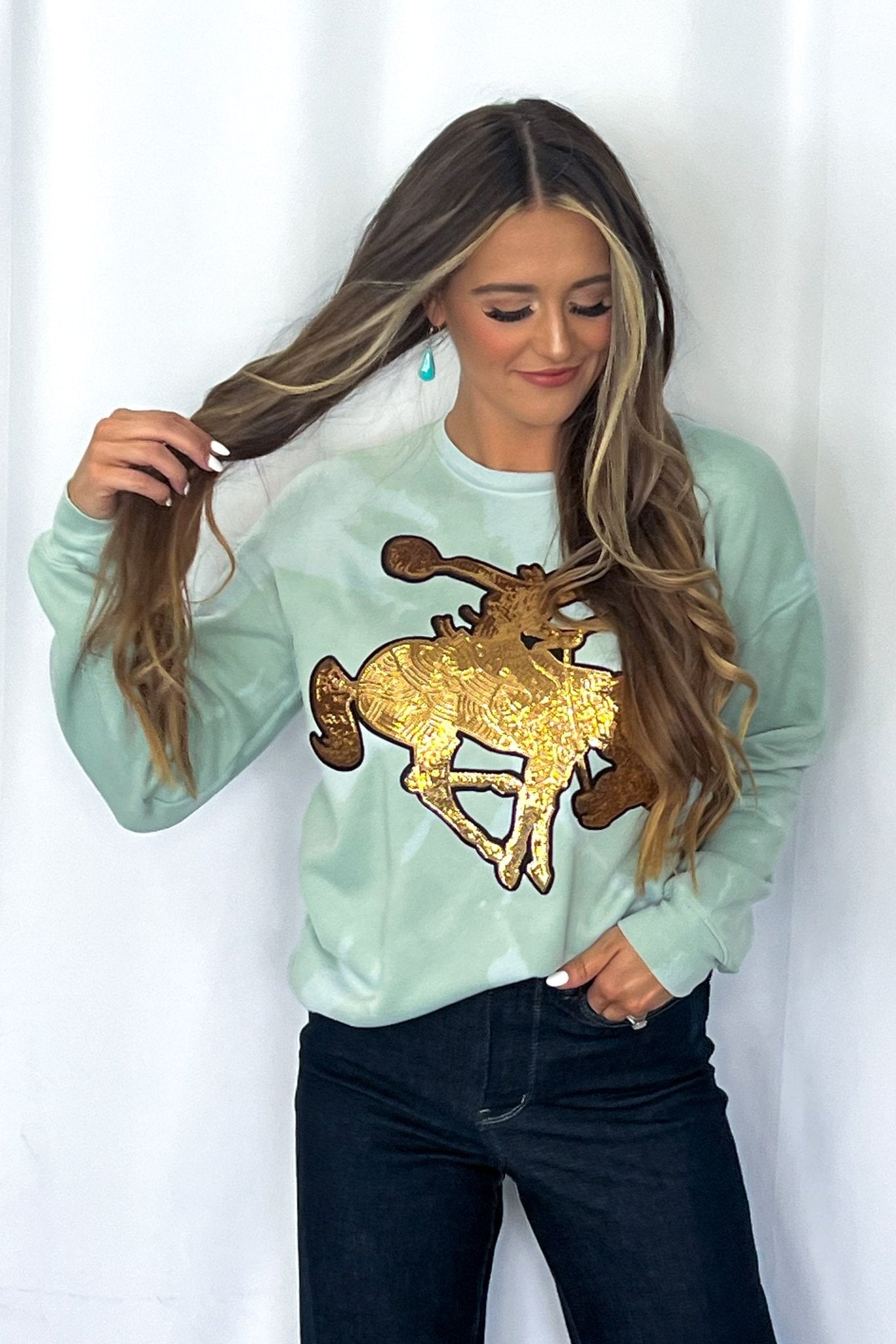Crazy Consuela "Gold Sequin Horse" Bleached Western Sweatshirt — Bella + Canvas Aqua Sky Background with Cowboy Patch