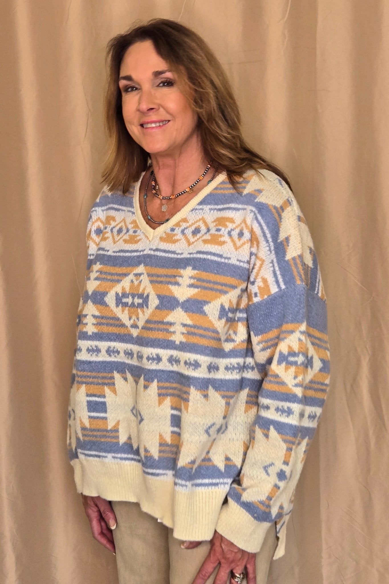 Main Strip Southwestern Knit Sweater — Oversized V-Neck with Bold Blue, Tan & Cream Print